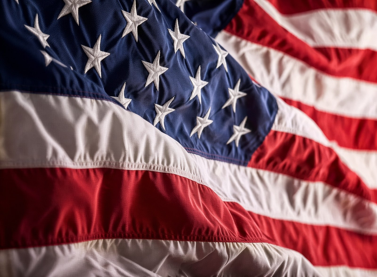 An American flag, close enough to see the stars and stripes